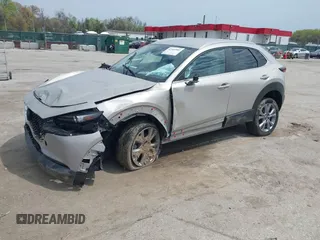 2022 Mazda CX-30 S Select z VIN 3MVDMBBL2NM439681, wystawiony jako IAAI lot #41960902 z przebiegiem 22 730 mil mil oraz . Historia ofert i sprzedaży dostępna na DreamBid. Obrazek 20.