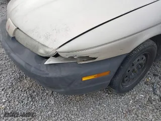 1999 Saturn SL with VIN 1G8ZH5282XZ273375, listed as a IAAI auction lot 41787290 with 230,397 mi miles. Bid and sale history available at carsss.com. Image 6.