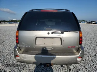 2003 GMC Envoy SLT z VIN 1GKDS13S032373020, wystawiony jako Copart lot #54986765 z przebiegiem 235 711 mil mil oraz Tytuł czysty. Historia ofert i sprzedaży dostępna na DreamBid. Obrazek 6.
