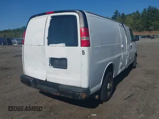 2014 Chevrolet Express Cargo with VIN 1GCWGGCA5E1125676, listed as a IAAI auction lot 42234161 with 285,045 mi miles and . Bid and sale history available at DreamBid. Image 4.