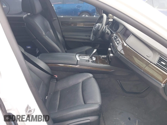 2015 BMW 7 Series 740Li with VIN WBAYE4C54FD947205, listed as a IAAI auction lot 41566291 with 172,729 mi miles and . Bid and sale history available at DreamBid. Image 5.