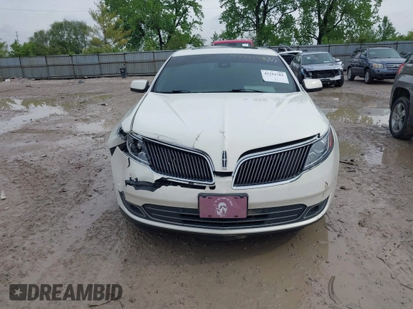 2013 Lincoln MKS EcoBoost with VIN 1LNHL9FT4DG604661, listed as a IAAI auction lot 42211781 with 134,902 mi miles and . Bid and sale history available at DreamBid. Image 12.