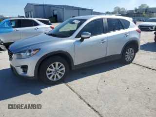 2016 Mazda CX-5 Touring z VIN JM3KE2CY3G0631964, wystawiony jako Copart lot #58816225 z przebiegiem 136 611 mil mil oraz Szkoda całkowita • Salvage title. Historia ofert i sprzedaży dostępna na DreamBid. Obrazek 1.