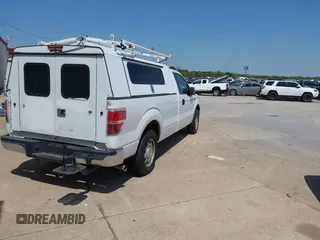 2012 Ford F-150 XL with VIN 1FTMF1CM7CKE24675, listed as a IAAI auction lot 41884476 with 127,455 mi miles. Bid and sale history available at carsss.com. Image 4.