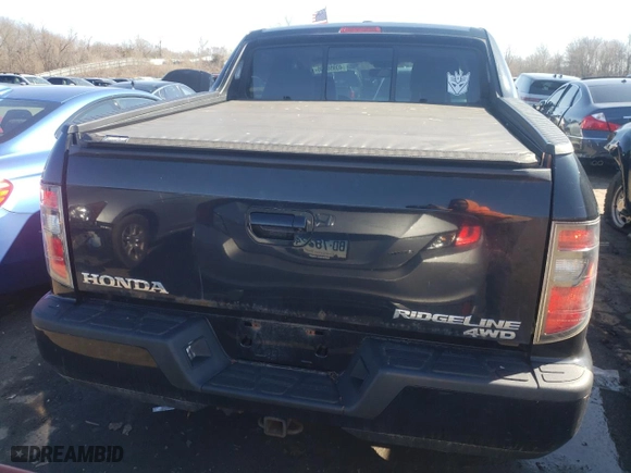 2013 Honda Ridgeline RTL with VIN 5FPYK1F53DB011174, listed as a Copart auction lot 49956805 with 235,485 mi miles and Clean Title. Bid and sale history available at carsss.com. Image 6.