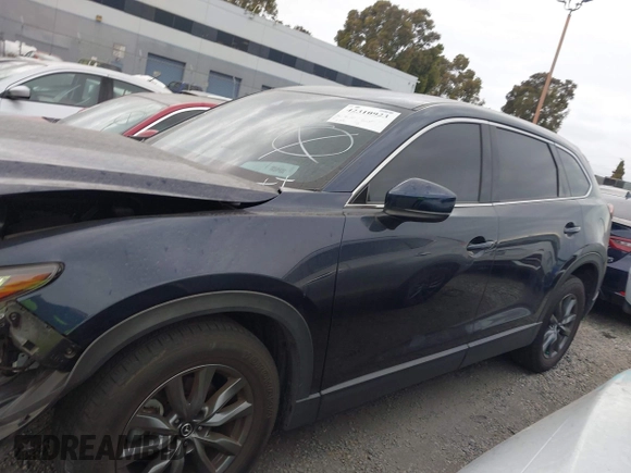 2021 Mazda CX-9 Touring with VIN JM3TCACY9M0526880, listed as a IAAI auction lot 42310923 with 25,991 mi miles and . Bid and sale history available at DreamBid. Image 15.