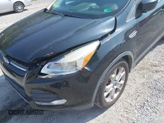 2013 Ford Escape SE z VIN 1FMCU9GX5DUA19887, wystawiony jako IAAI lot #42580986 z przebiegiem 169 407 mil mil oraz . Historia ofert i sprzedaży dostępna na DreamBid. Obrazek 17.