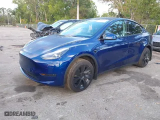 2024 Tesla Model Y with VIN 7SAYGDED5RF015208, listed as a IAAI auction lot 41608087 with NaN miles. Bid and sale history available at carsss.com. Image 17.