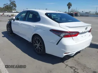 2023 Toyota Camry SE with VIN 4T1G11AK9PU751579, listed as a IAAI auction lot 42014251 with 35,748 mi miles. Bid and sale history available at carsss.com. Image 3.