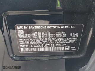 2018 BMW X1 sDrive28i with VIN WBXHU7C39J5L07129, listed as a IAAI auction lot 41472014 with 56,486 mi miles. Bid and sale history available at carsss.com. Image 9.