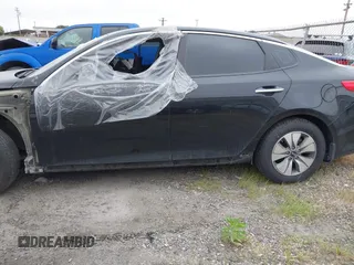 2017 Kia Optima Hybrid with VIN KNAGT4LEXH5014570, listed as a IAAI auction lot 41910017 with 126,532 mi miles. Bid and sale history available at carsss.com. Image 15.