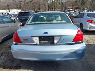 2005 Ford Crown Victoria LX with VIN 2FAFP74W65X135964, listed as a IAAI auction lot 41271175 with 82,494 mi miles. Bid and sale history available at carsss.com. Image 16.