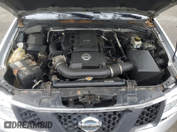 2007 Nissan Frontier SE with VIN 1N6AD09W97C423634, listed as a Copart auction lot 60997335 with 161,871 mi miles and Salvage title. Bid and sale history available at DreamBid. Image 11.