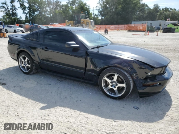 2005 Ford Mustang Deluxe with VIN 1ZVFT80N055111232, listed as a Copart auction lot 62728805 with 171,848 mi miles and Salvage title. Bid and sale history available at DreamBid. Image 4.