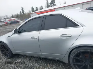 2009 Cadillac CTS RWD w/1SA with VIN 1G6DF577890171787, listed as a IAAI auction lot 41883724 with 146,251 mi miles. Bid and sale history available at carsss.com. Image 14.