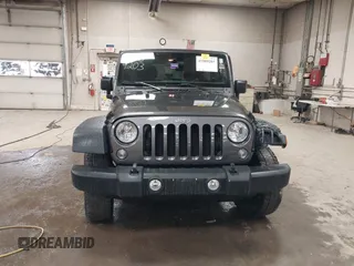 2018 Jeep Wrangler JK Unlimited Sport S with VIN 1C4BJWDGXJL889020, listed as a IAAI auction lot 41989203 with 60,170 mi miles. Bid and sale history available at carsss.com. Image 12.