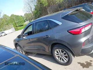 2021 Ford Escape SE z VIN 1FMCU9G66MUA11210, wystawiony jako IAAI lot #42205135 z przebiegiem 35 165 mil mil oraz . Historia ofert i sprzedaży dostępna na DreamBid. Obrazek 14.