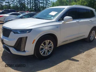 2024 Cadillac XT6 FWD Luxury z VIN 1GYKPAR49RZ739032, wystawiony jako IAAI lot #41985694 z przebiegiem 20 595 mil mil oraz . Historia ofert i sprzedaży dostępna na DreamBid. Obrazek 2.