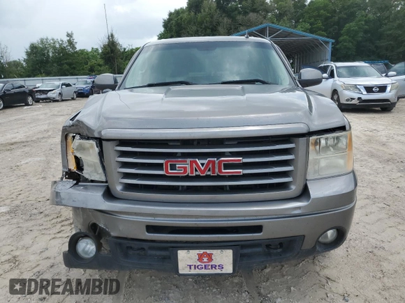 2013 GMC Sierra 1500 SLT with VIN 3GTP2WE25DG134770, listed as a Copart auction lot 59616535 with 212,304 mi miles and Salvage title. Bid and sale history available at DreamBid. Image 5.