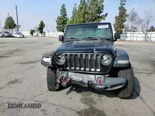 2020 Jeep Gladiator Rubicon z VIN 1C6JJTBG7LL197837, wystawiony jako Copart lot #58169095 z przebiegiem 59 578 mil mil oraz Szkoda całkowita • Salvage title. Historia ofert i sprzedaży dostępna na DreamBid. Obrazek 13.