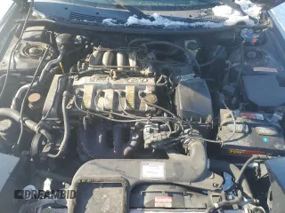 1996 Ford Probe z VIN 1ZVLT20A6T5129311, wystawiony jako Copart lot #87306604 z przebiegiem 117 729 mil mil oraz Tytuł czysty. Historia ofert i sprzedaży dostępna na DreamBid. Obrazek 11.