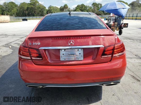 2014 Mercedes-Benz E 350 with VIN WDDKJ5KB2EF224463, listed as a Copart auction lot 57806985 with 69,980 mi miles and Salvage title. Bid and sale history available at DreamBid. Image 6.