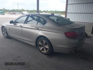 2013 BMW 5 Series 528i with VIN WBAXG5C52DDY35141, listed as a IAAI auction lot 41883031 with 112,917 mi miles and . Bid and sale history available at carsss.com. Image 3.