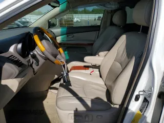 2005 Lexus RX 330 with VIN JTJGA31U050055440, listed as a Copart auction lot 61419815 with 144,959 mi miles and Salvage title. Bid and sale history available at DreamBid. Image 7.
