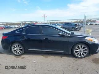 2014 Hyundai Azera Limited with VIN KMHFH4JG7EA353094, listed as a IAAI auction lot 41043222 with 184,924 mi miles and . Bid and sale history available at DreamBid. Image 13.
