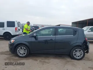 2014 Chevrolet Sonic LT with VIN 1G1JC6SH5E4153094, listed as a IAAI auction lot 41506576 with 118,833 mi miles. Bid and sale history available at carsss.com. Image 14.