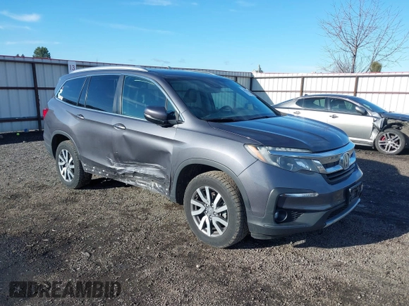 2019 Honda Pilot EX-L with VIN 5FNYF6H5XKB038196, listed as a IAAI auction lot 41852236 with 99,477 mi miles. Bid and sale history available at carsss.com. Image 1.