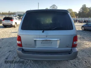 2004 Kia Sedona LX with VIN KNDUP131346508490, listed as a Copart auction lot 77391594 with 41,211 mi miles and Salvage Title. Bid and sale history available at carsss.com. Image 6.