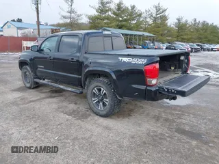 2016 Toyota Tacoma SR with VIN 3TMCZ5AN2GM027945, listed as a IAAI auction lot 41446277 with 51,781 mi miles and . Bid and sale history available at DreamBid. Image 3.