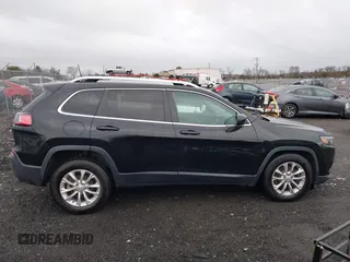 2019 Jeep Cherokee Latitude with VIN 1C4PJLCBXKD357403, listed as a IAAI auction lot 41606497 with 104,102 mi miles and . Bid and sale history available at carsss.com. Image 13.