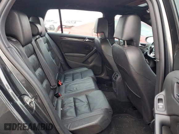 2010 Volkswagen GTI with VIN WVWHV7AJ2AW400192, listed as a Copart auction lot 86180024 with 124,705 mi miles and Salvage Title. Bid and sale history available at carsss.com. Image 10.