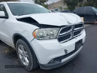 2013 Dodge Durango SXT z VIN 1C4RDHAG7DC694986, wystawiony jako IAAI lot #42181381 z przebiegiem 170 669 mil mil oraz . Historia ofert i sprzedaży dostępna na DreamBid. Obrazek 17.