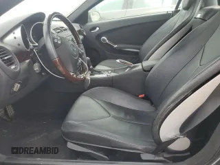 2007 Mercedes-Benz SLK-Class 3.0L with VIN WDBWK54F27F138919, listed as a Copart auction lot 72077514 with 64,519 mi miles and Salvage Title. Bid and sale history available at carsss.com. Image 7.