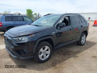 2021 Toyota RAV4 Hybrid LE with VIN 2T3L6RFV7MW011159, listed as a IAAI auction lot 42212998 with 104,626 mi miles and . Bid and sale history available at DreamBid. Image 2.