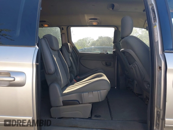 2005 Dodge Caravan SXT with VIN 2D4GP44LX5R540512, listed as a IAAI auction lot 42140912 with 259,855 mi miles and . Bid and sale history available at carsss.com. Image 8.