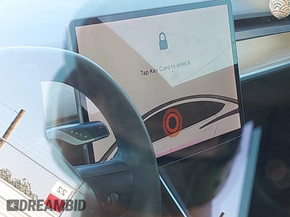 2019 Tesla Model 3 Long Range with VIN 5YJ3E1EB1KF510912, listed as a IAAI auction lot 41857775 with Not Provided miles and . Bid and sale history available at DreamBid. Image 15.