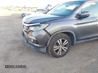 2017 Honda Pilot EX-L with VIN 5FNYF5H74HB010026, listed as a IAAI auction lot 41633770 with 170,383 mi miles and . Bid and sale history available at DreamBid. Image 20.