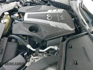 2017 Infiniti Q50 Premium z VIN JN1EV7AR5HM833829, wystawiony jako IAAI lot #41921614 z przebiegiem 92 807 mil mil oraz . Historia ofert i sprzedaży dostępna na DreamBid. Obrazek 21.