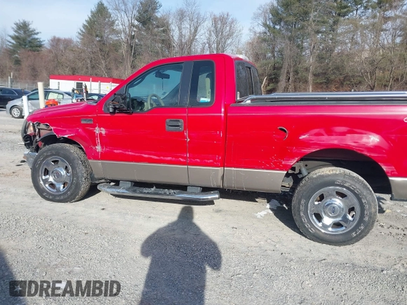 2005 Ford F-150 XL with VIN 1FTRF14W05NA77908, listed as a IAAI auction lot 41382643 with 128,135 mi miles. Bid and sale history available at carsss.com. Image 6.