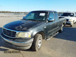 2002 Ford F-150 XL with VIN 2FTRX17282CA94608, listed as a IAAI auction lot 41215380 with 1 mi miles. Bid and sale history available at carsss.com. Image 2.