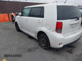 2014 Scion xB with VIN JTLZE4FEXEJ054060, listed as a IAAI auction lot 42096159 with 211,994 mi miles. Bid and sale history available at carsss.com. Image 3.