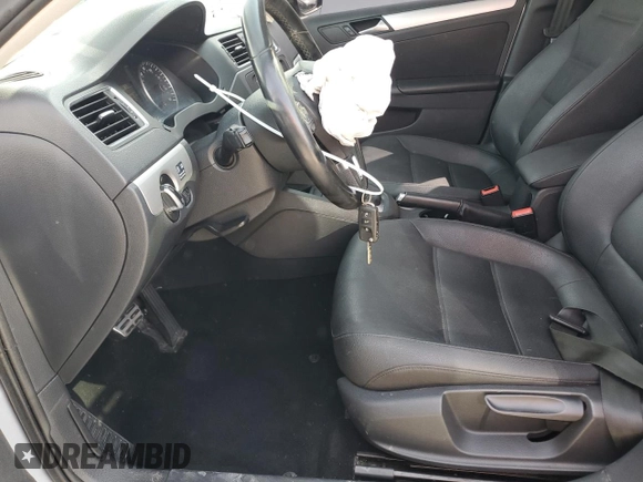 2012 Volkswagen Jetta TDI w/Premium с VIN 3VWLL7AJ7CM388380, выставлен на аукционе Copart как лот 51874145 с пробегом 128 270 миль миль и Списание • Salvage title. История ставок и продаж доступна на DreamBid. Изображение 7.