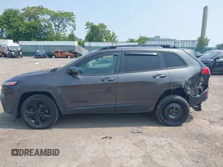 2016 Jeep Cherokee Latitude with VIN 1C4PJMCBXGW122274, listed as a IAAI auction lot 42407175 with 152,229 mi miles and . Bid and sale history available at DreamBid. Image 14.