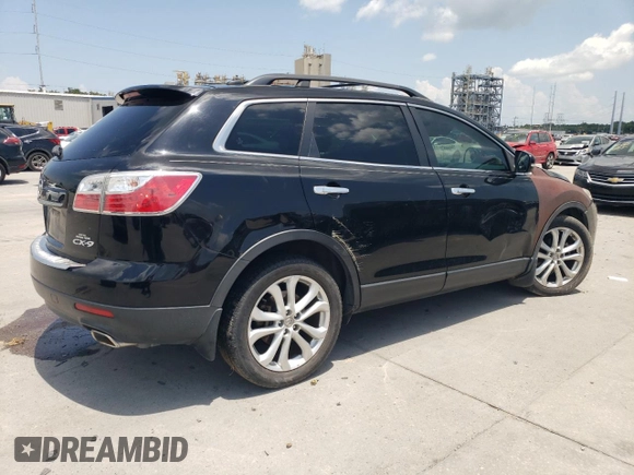 2012 Mazda CX-9 Grand Touring with VIN JM3TB2DA4C0361023, listed as a Copart auction lot 63839005 with 140,784 mi miles and Salvage title. Bid and sale history available at DreamBid. Image 3.