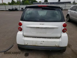 2012 Smart fortwo Pure с VIN WMEEJ3BA1CK573090, выставлен на аукционе Copart как лот 59881025 с пробегом 128 086 миль миль и Чистый • Clean title. История ставок и продаж доступна на DreamBid. Изображение 6.