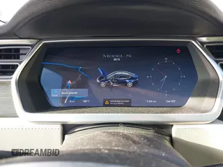 2014 Tesla Model S 60 z VIN 5YJSA1H11EFP30596, wystawiony jako IAAI lot #42235901 z przebiegiem 143 837 mil mil oraz . Historia ofert i sprzedaży dostępna na DreamBid. Obrazek 19.